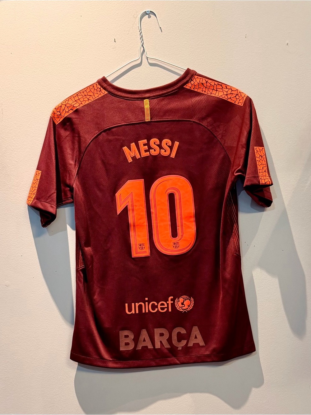 Nike Kids Maroon Football Jersey with Bright Orange Accents